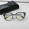 Chrome Hearts thick rimmed hollow out glasses with gold colored legs